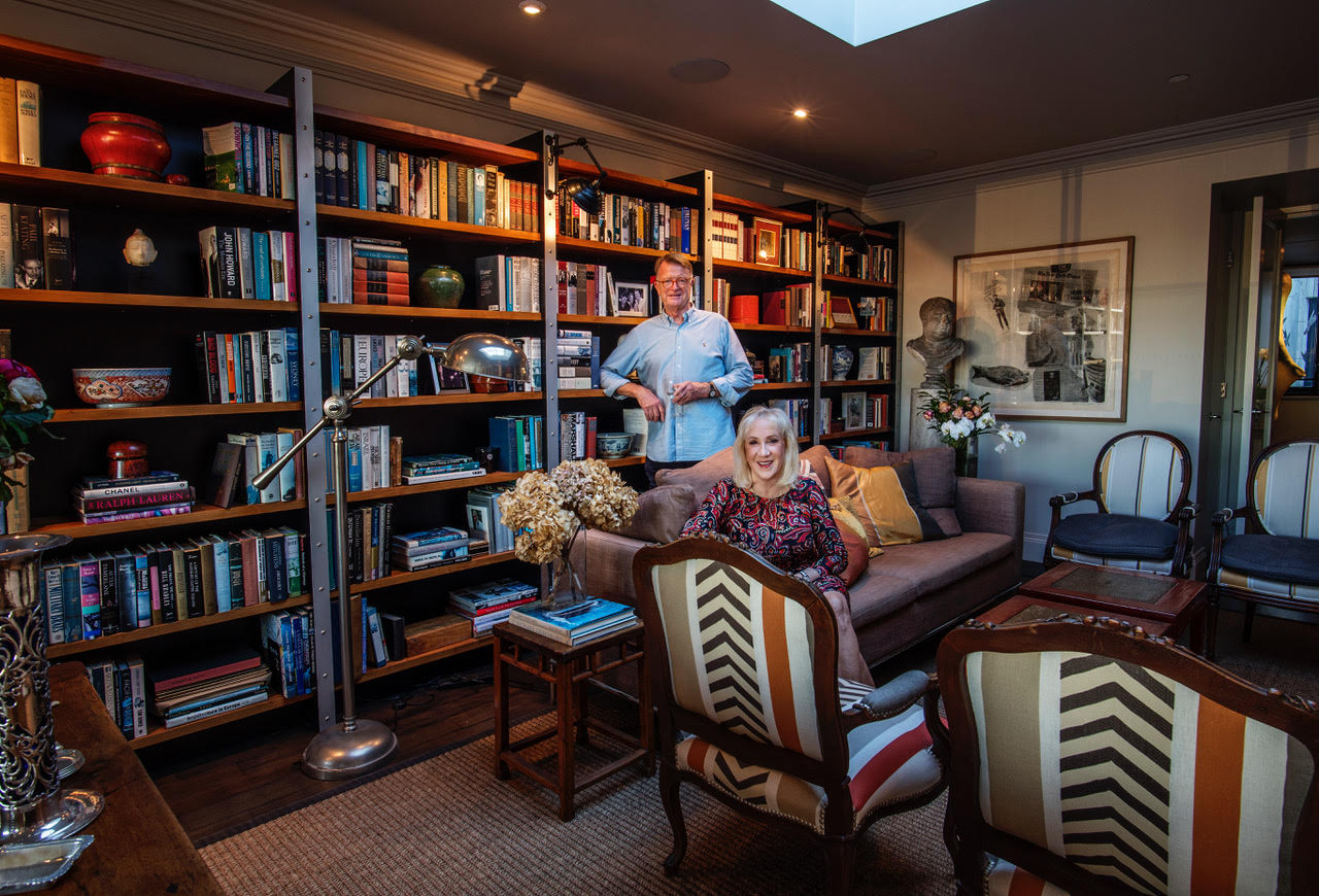 Pam Williams and Warren Scott in their library